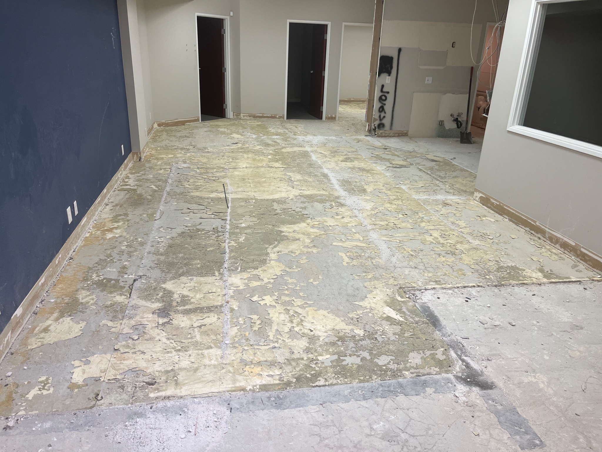Commercial interior after debris and flooring material were removed