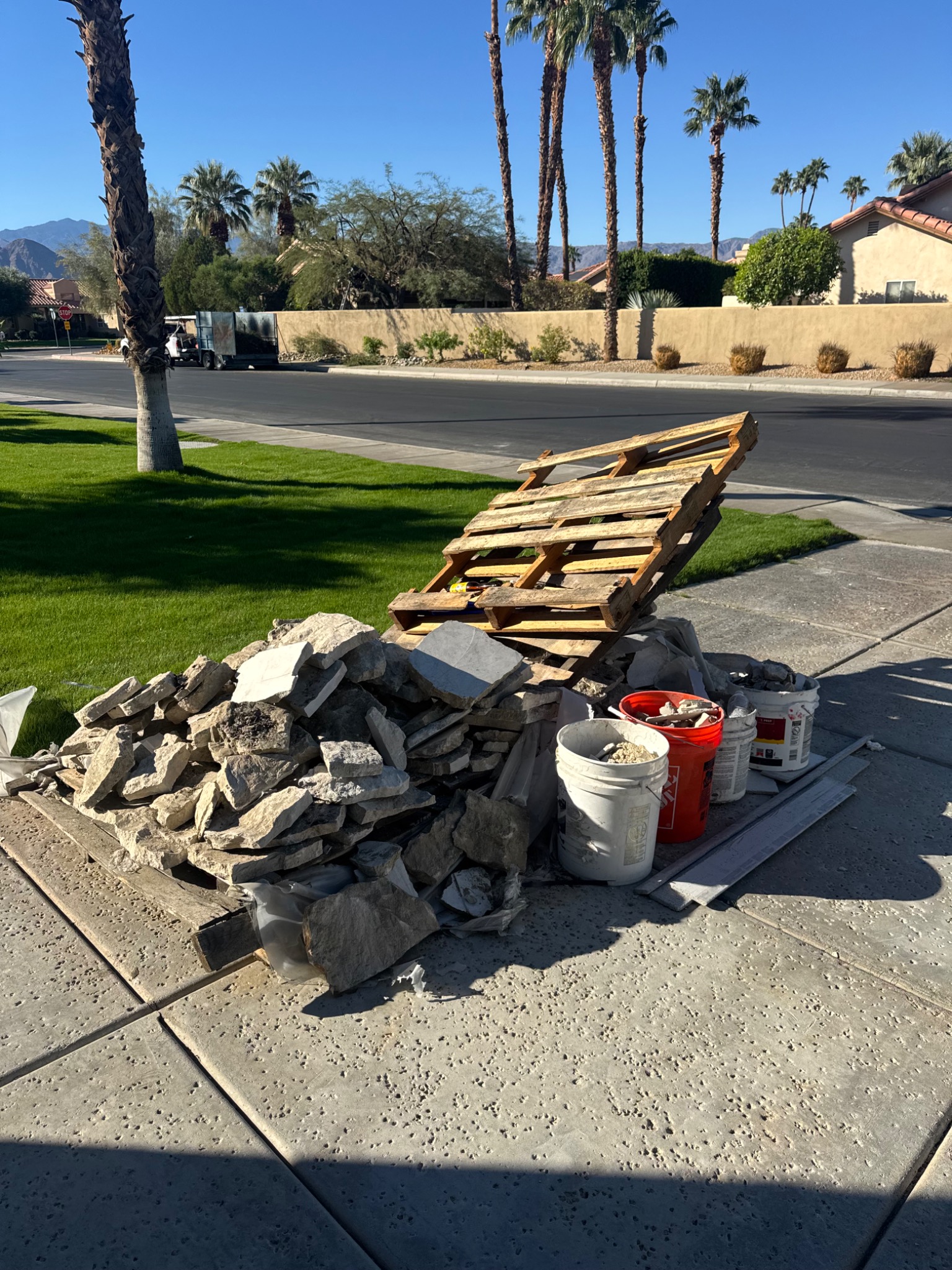 Construction debris staged for curbside pickup